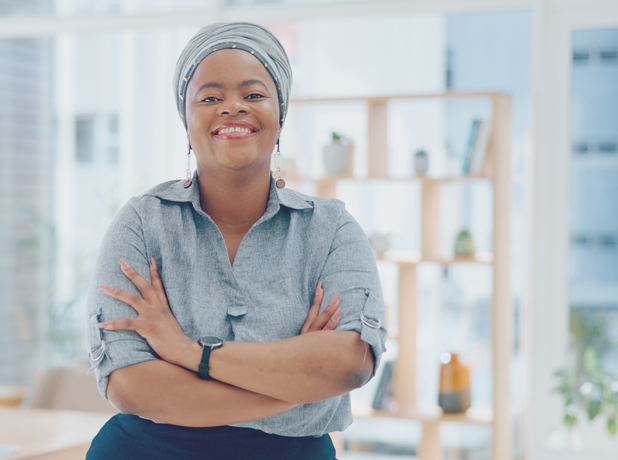 Portrait, arms crossed and happy black woman in office with smile, pride and senior startup business entrepreneur.