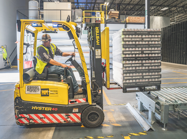 man driving forklift