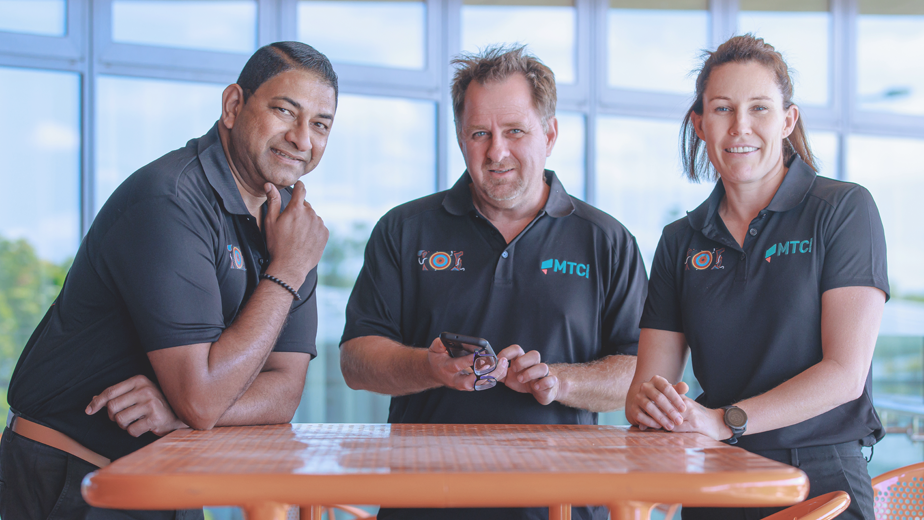 n image of three MTC Staff members at one of our recent JobMeet Events in Queensland. They are wearing MTC uniform and looking at the camera.