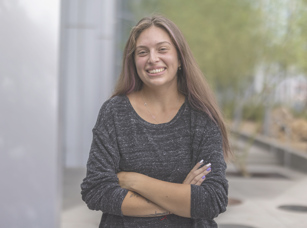 Media Text Split Module - 618x460px - 2 Young adult lady looking at the camera and smiling.